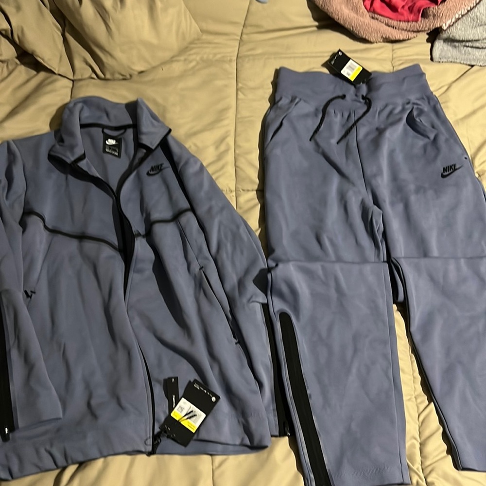 Brand new womens nike suit size small